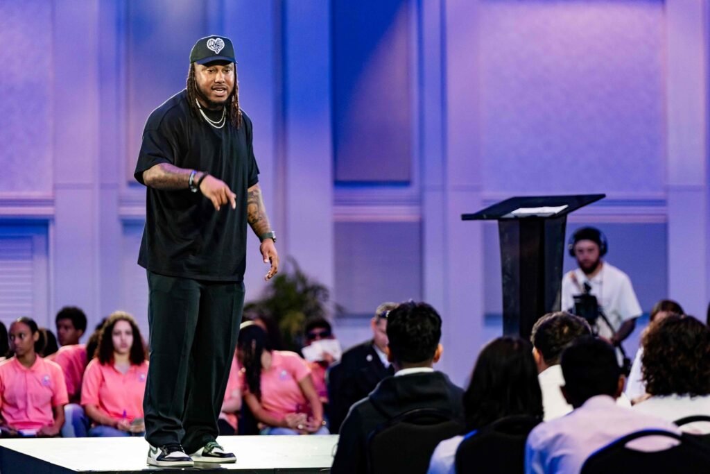 Trent Shelton delivering his keynote “It All Starts With You” at Voices of Tourism in Aruba.